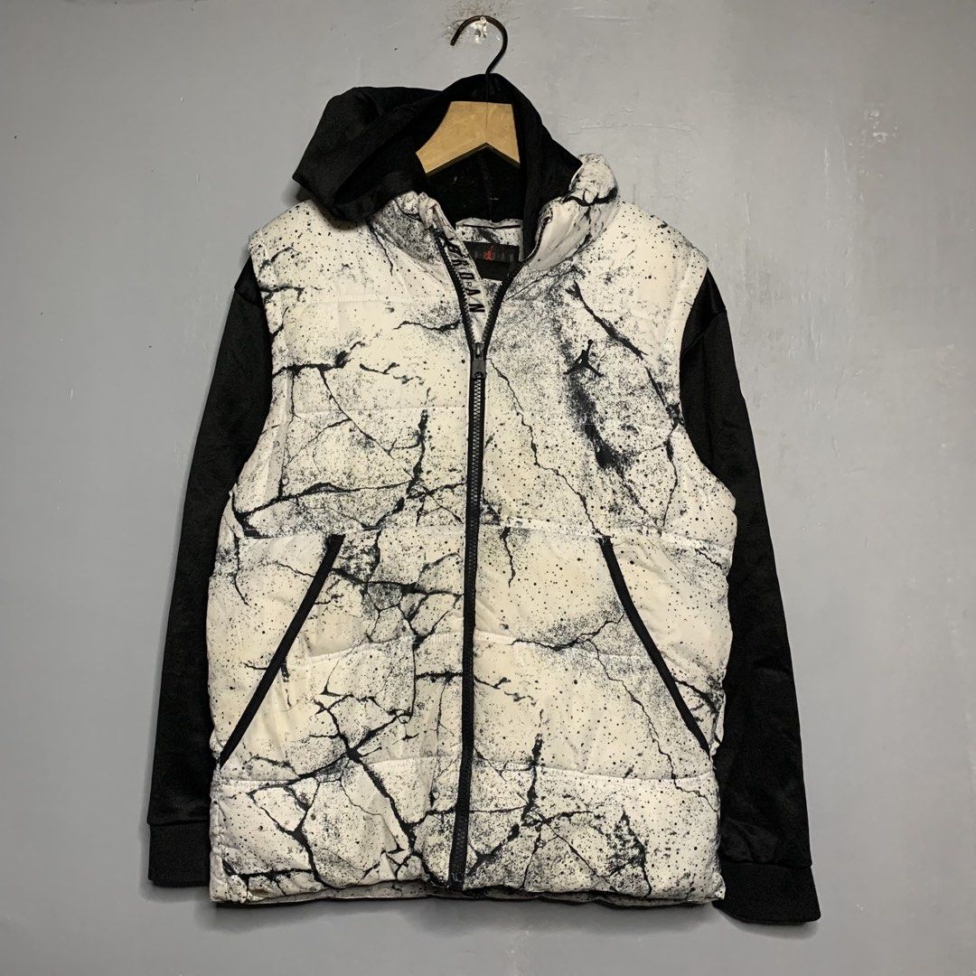 Jordan Puffer Jacket White Black Crackle Print (Category: Coats, Jackets and Outerwear) located in Manila. Submitted by emplysthrift. (Listing ID 1459375300, Image 1). Description: - Cool Jordan puffer jacket - Unique white and black crackle print design - Black sleeves and hood - Zip-up front with pockets - Perfect for staying warm and stylish - A must-have for any Jordan fan Jordan Puffer Jacket White Black Crackle Print Width "20 Length "24 Ex