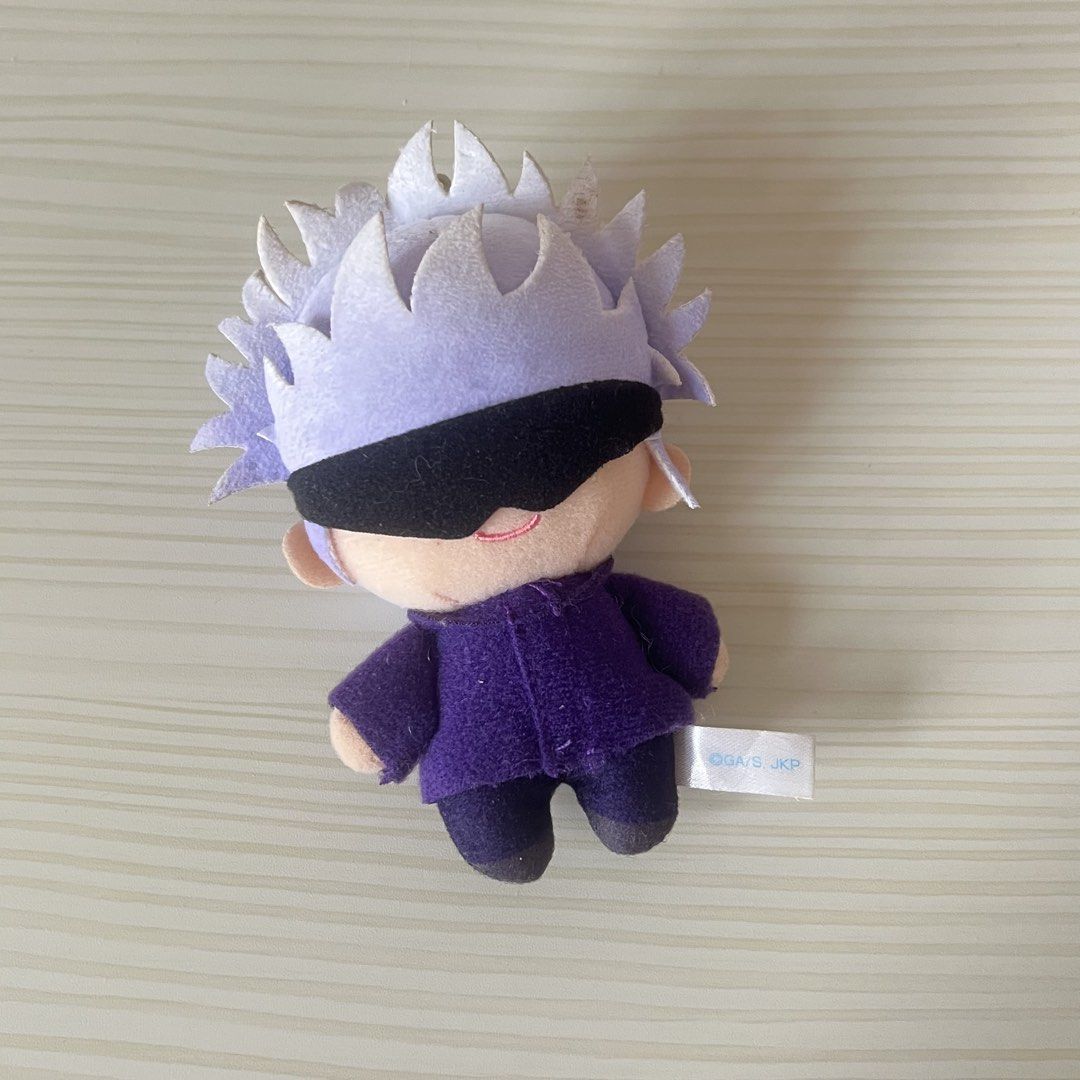 Jujutsu Kaisen Gojo Satoru Plush (Category: Plushies & Soft Toys) located in Quezon City. Submitted by miaochiinyami (Listing ID 1459367699, Image 1). Description: no tag and chain flaw: mark (pic 2), i tried removing with wipes but still not completely removed.