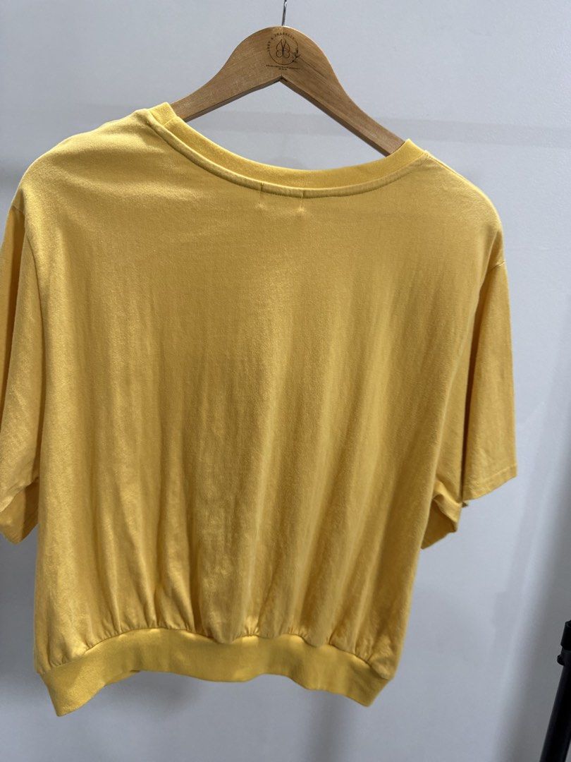 Kashieca Yellow Blouse (Category: Shirts) located in Taguig. Submitted by dyaaanel (Listing ID 1459337571, Image 2). Description: 💛 Kashieca Yellow Blouse with Garterized Bottom ✨ Selling Price: ₱350 🏷️ Brand: Kashieca 👗 Size: Large — can fit up to X 💛 Color: Yellow 🏷️ Condition: Good. No visible signs of usage 📸 Actual photos for reference. RFS: Decluttering unused and slightly used clothes Disclaimer: This item is pre-loved unless stated 