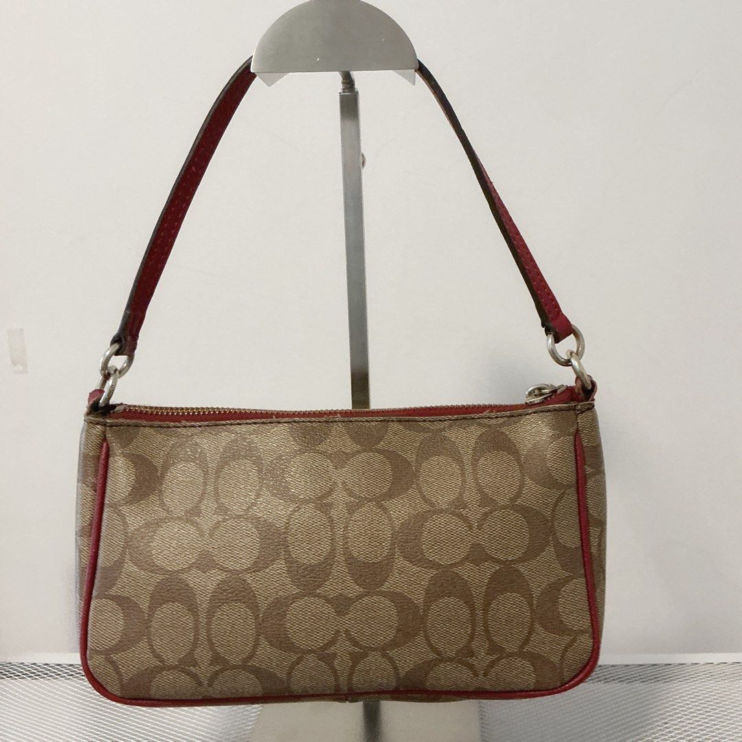 Coach Red Kili Bag (Category: Luxury Bags & Wallets) located in Valenzuela. Submitted by zai_kive (Listing ID 1459324293, Image 3). Description: N/G/A (good for personal use) With issue sa may bandang handle With sling.