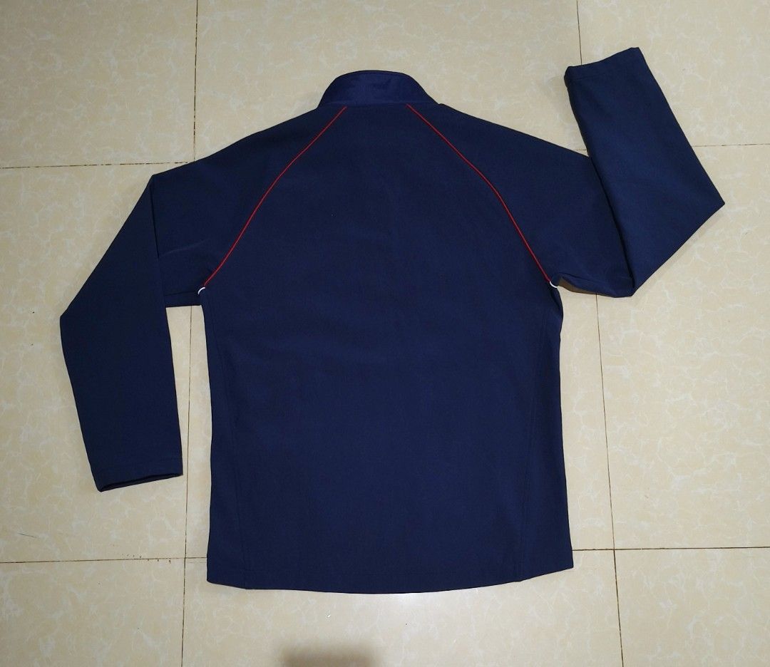 Lacoste Navy Blue Track Jacket (Category: Coats, Jackets and Outerwear) located in Manila. Submitted by purefire-477a (Listing ID 1459353790, Image 2). Description: - Navy blue Lacoste track jacket - White piping details on shoulders and arms - Red zipper with a ring pull - Two zippered front pockets - Ideal for casual wear or sports - Size: 21.5" width x 27-28" length.