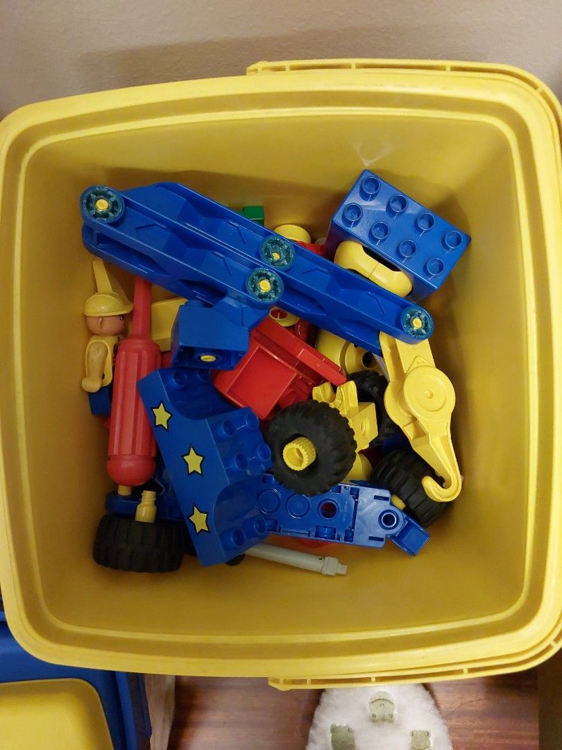 Large Building Blocks Construction Toy Set (Category: Lego & Building Sets) located in Caloocan City. Submitted by ericajane_tc (Listing ID 1459401658, Image 2). Description: - Large tub of building blocks - Features blue, red, and yellow pieces - Includes wheels, crane parts, and assorted lego for builders - Encourages creative building and imaginative play - Provides hours of entertainment - Sold as a bundle.