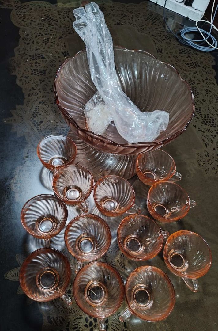 Large Reddish Punch Bowl Set (27pieces) (Category: Other Kitchenware & Tableware) located in Quezon City. Submitted by oddduck02 (Listing ID 1455771015, Image 3). Description: - Large Colored Punch Bowl set - Never been used; in its original box. Stored in the cabinet the whole time - Made of Glass (hooks and ladle made of plastic) - Comes packed in a cardboard box with protective padding - Newell brand - Punch Bowl set includes the ff: 1 Bowl = 