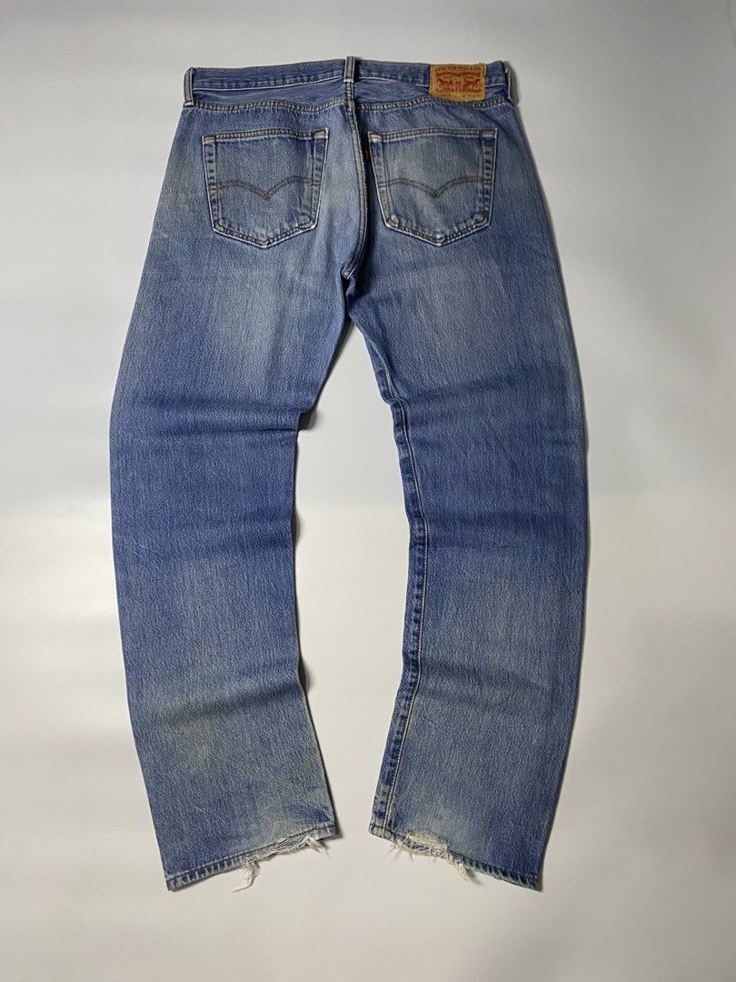 Levi's 501 Button Fly Jeans W36 L32 (Category: Jeans) located in Cabuyao City. Submitted by macnthrifts. (Listing ID 1459407550, Image 1). Description: - Classic Levi's 501 jeans - Button fly closure - Medium wash blue denim - Distressed knees and rips (as pictured) - Frayed hem - Wardrobe staple for casual wear.