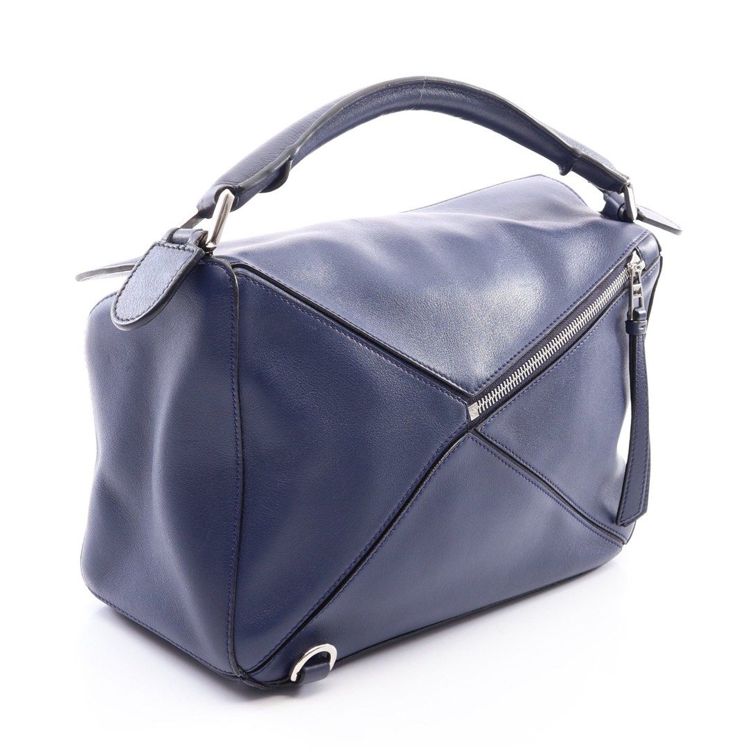 Loewe Puzzle Bag Medium 2-Way Handbag Leather Navy (Category: Luxury Bags & Wallets) located in Las Pinas. Submitted by daisuki_japan_luxury_by_reiko (Listing ID 1459295418, Image 2). Description: Notable damage areas remarks Due to the nature of used items, there may be minor damage that is not visible in the images, and the color may appear different from the actual item depending on your monitor settings. If you have any questions about the co