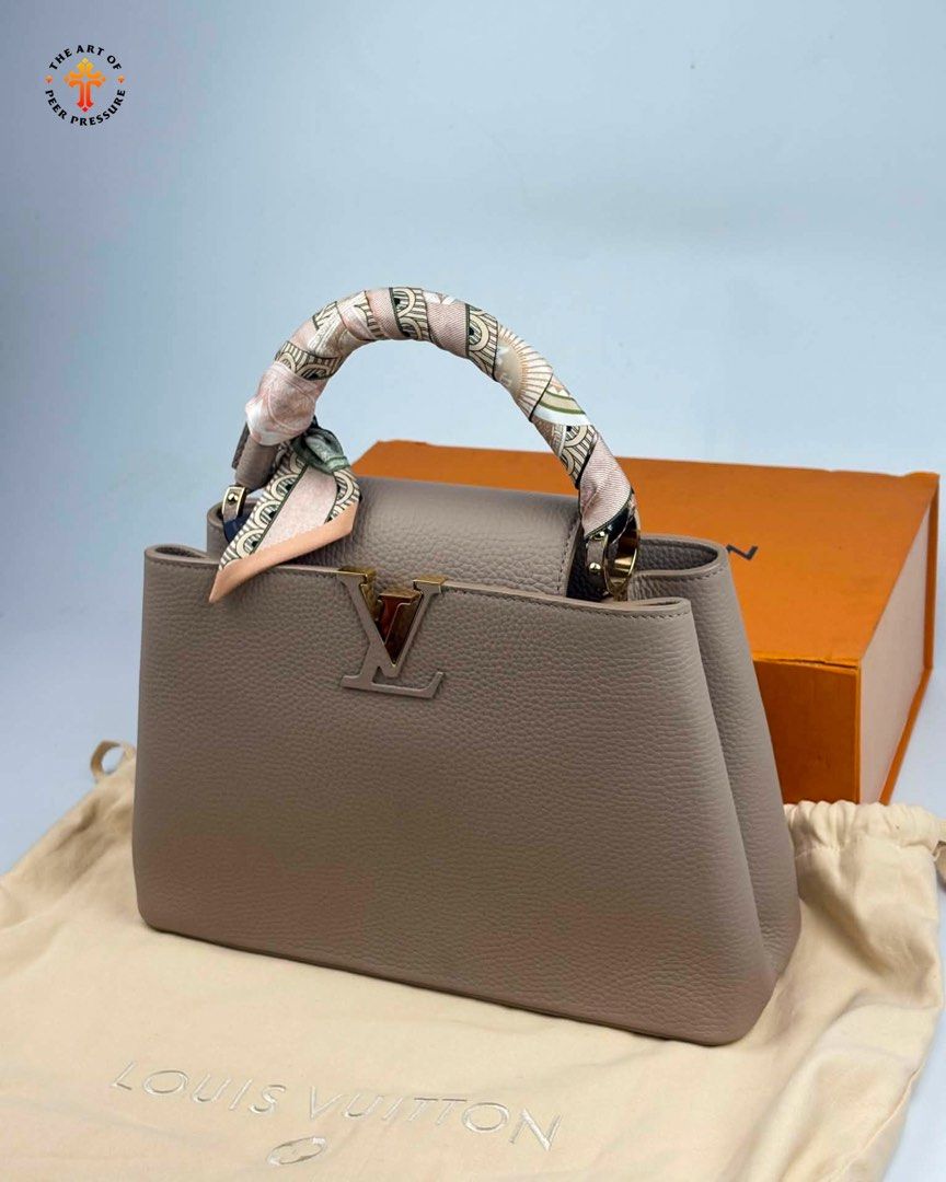 Louis Vuitton Capucines MM (Category: Luxury Bags & Wallets) located in Calamba. Submitted by theartofpeerpressurelgn (Listing ID 1459392800, Image 1). Description: LV Capucines MM Microchipped, with certificate of authenticity. Brand new, complete with free LV scarf worth 30K. Retails for 480K in stores. Selling for only 310K. Message for inquiries. FB: The Art of Peer Pressure IG: @theartofpeerpressurelgn.