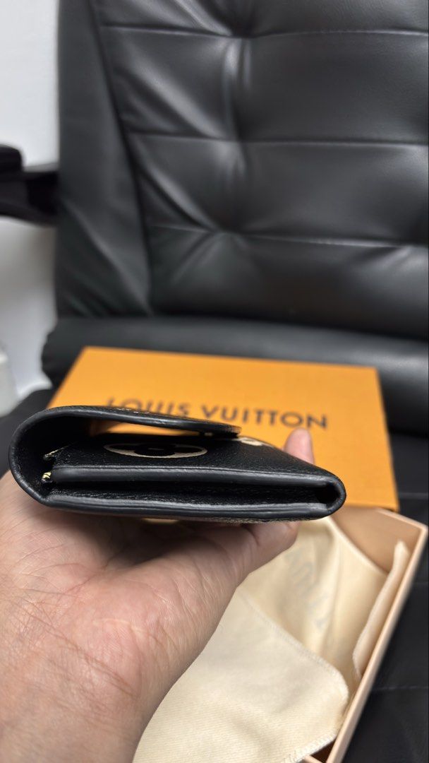 LOUIS VUITTON Emilie Black Monogram Empreinte Leather Wallet (Category: Luxury Bags & Wallets) located in Taguig. Submitted by shoppersluxe2394 (Listing ID 1459422809, Image 2). Description: .