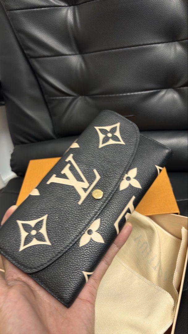 LOUIS VUITTON Emilie Black Monogram Empreinte Leather Wallet (Category: Luxury Bags & Wallets) located in Taguig. Submitted by shoppersluxe2394 (Listing ID 1459422809, Image 1). Description: .