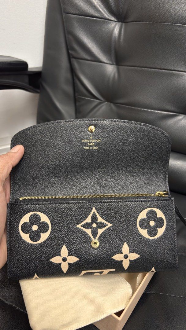 LOUIS VUITTON Emilie Black Monogram Empreinte Leather Wallet (Category: Luxury Bags & Wallets) located in Taguig. Submitted by shoppersluxe2394 (Listing ID 1459422809, Image 3). Description: .