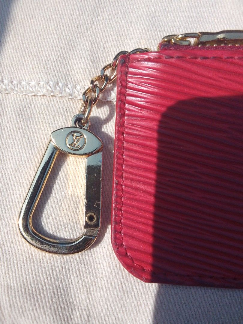 Louis Vuitton Epi Key Pouch (Category: Luxury Bags & Wallets) located in Pantukan. Submitted by safe_vintage_hunter (Listing ID 1459380977, Image 3). Description: (off/legit) not yet authenticated. need offer below 1k below 500 if it's fake please no refund or return..