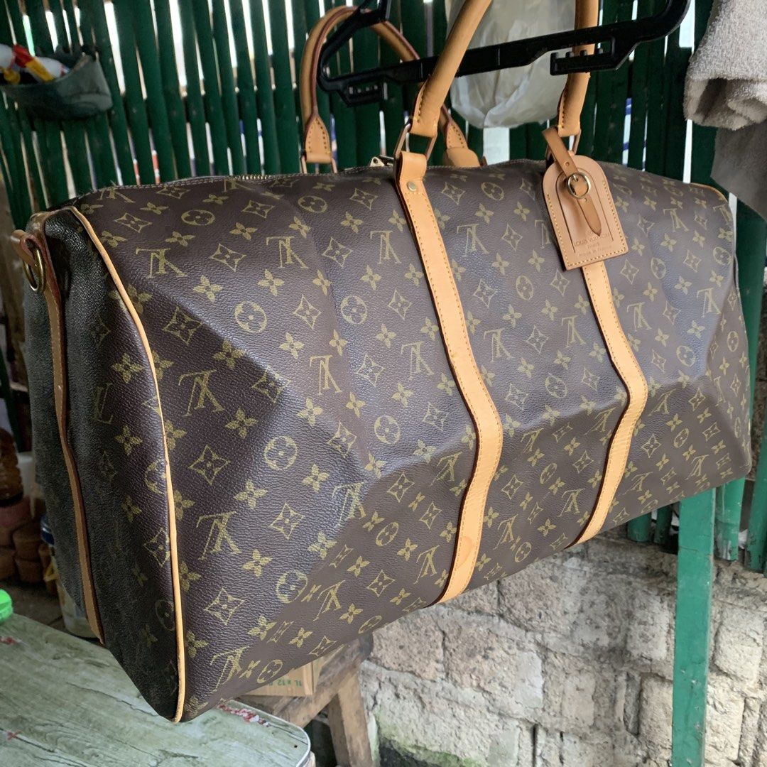 Louis Vuitton Monogram Keepall 55 Duffle Bag (Category: Luxury Bags & Wallets) located in Cebu City. Submitted by jkeive (Listing ID 1459486891, Image 2). Description: - Classic Louis Vuitton Keepall 55 - Iconic monogram canvas with vachetta leather trim - Spacious interior, ideal for weekend trips or carry-on - Secure zipper closure - Includes original luggage tag - A timeless travel essential.