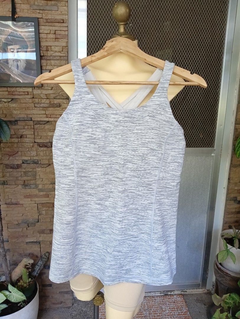 Lululemon Tank Twist Top (Category: Activewear) located in Rizal. Submitted by timeless_shop (Listing ID 1459410904, Image 3). Description: Original Lululemon Twist Tank Top DOT 10 📏 SUKAT: Dot Size: 10 Fit to Medium Frame Width Pit to Pit 16 inches Bust Size 34-36 Length: 16 inches Condition 9.8/10 Color Rate 9.8/10 Heather Gray - Twist design sa likod - May pad slot sa loob ✔️ No butas, no himulmol ✔️ Color Rate 9/10 - hindi kupas ✔️ Malinis a