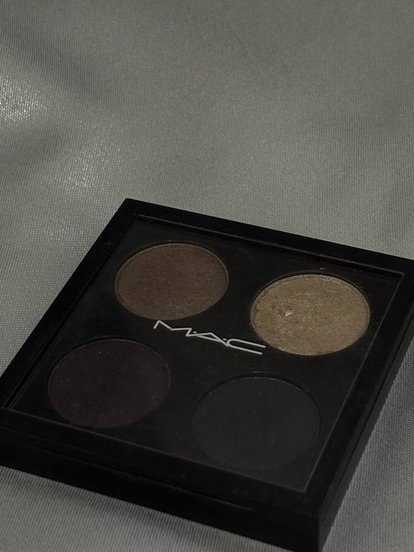 MAC 4-Pan Eyeshadow Palette (Category: Makeup) located in Apalit. Submitted by randomsellshop (Listing ID 1459487460, Image 1). Description: free shipping for sure buyers - MAC Eyeshadow Palette (4 Shades) - Shades: Shimmery Light Gold, Matte Brown, Deep Plum/Burgundy, Matte Black - Built-in Mirror - Versatile for various makeup looks.