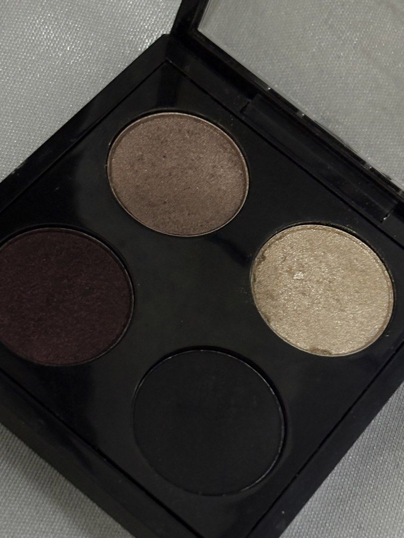 MAC 4-Pan Eyeshadow Palette (Category: Makeup) located in Apalit. Submitted by randomsellshop (Listing ID 1459487460, Image 2). Description: free shipping for sure buyers - MAC Eyeshadow Palette (4 Shades) - Shades: Shimmery Light Gold, Matte Brown, Deep Plum/Burgundy, Matte Black - Built-in Mirror - Versatile for various makeup looks.