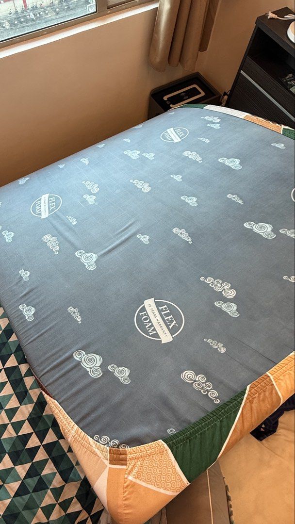 MANDAUE Flexi Foam Mattress Protector with Cloud Pattern (Category: Bed Frames & Mattresses) located in Quezon City. Submitted by jerupreloveditems (Listing ID 1459296157, Image 1). Description: - Grey mattress protector with adorable cloud pattern. - Features elasticated edges for a secure, snug fit. - Comes with a matching fitted sheet in a stylish geometric design. - Protects your mattress from spills and wear. - Adds a cute and stylish touch 