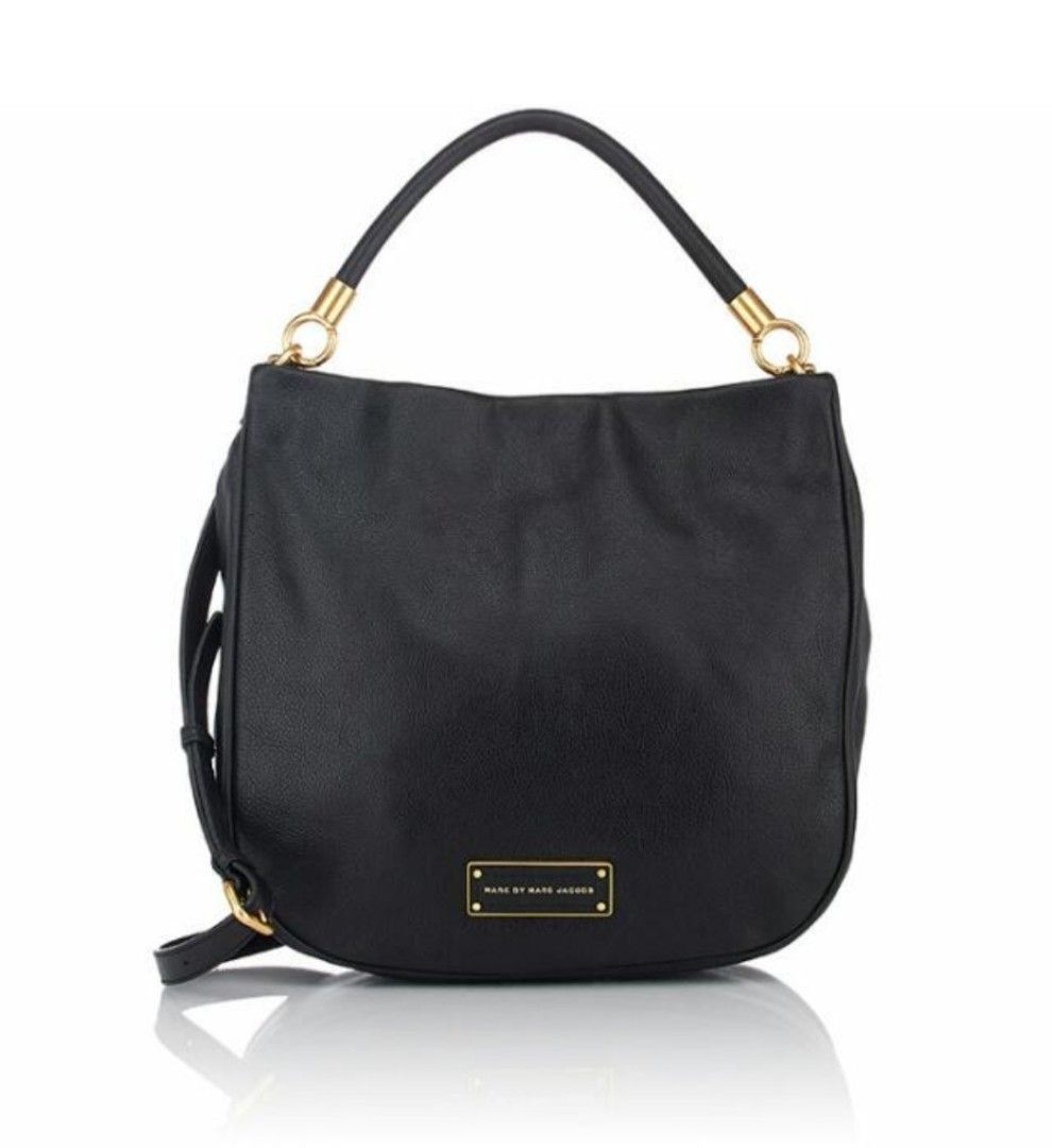 Marc by Marc Jacobs Black Leather Hobo Shoulder Bag (Category: Luxury Bags & Wallets) located in Manila. Submitted by wardrobemanila (Listing ID 1459412277, Image 1). Description: Selling my Pre owned AUTHENTIC Marc by Marc Jacobs bag Bought in Shangrila Mall at P25,000 Used less than 10 times only naka display lang sa walk in closet ng sobra tagal as in years hindi nagamit naka tago lang selling super duper low para ka lang bumili ng Charles and