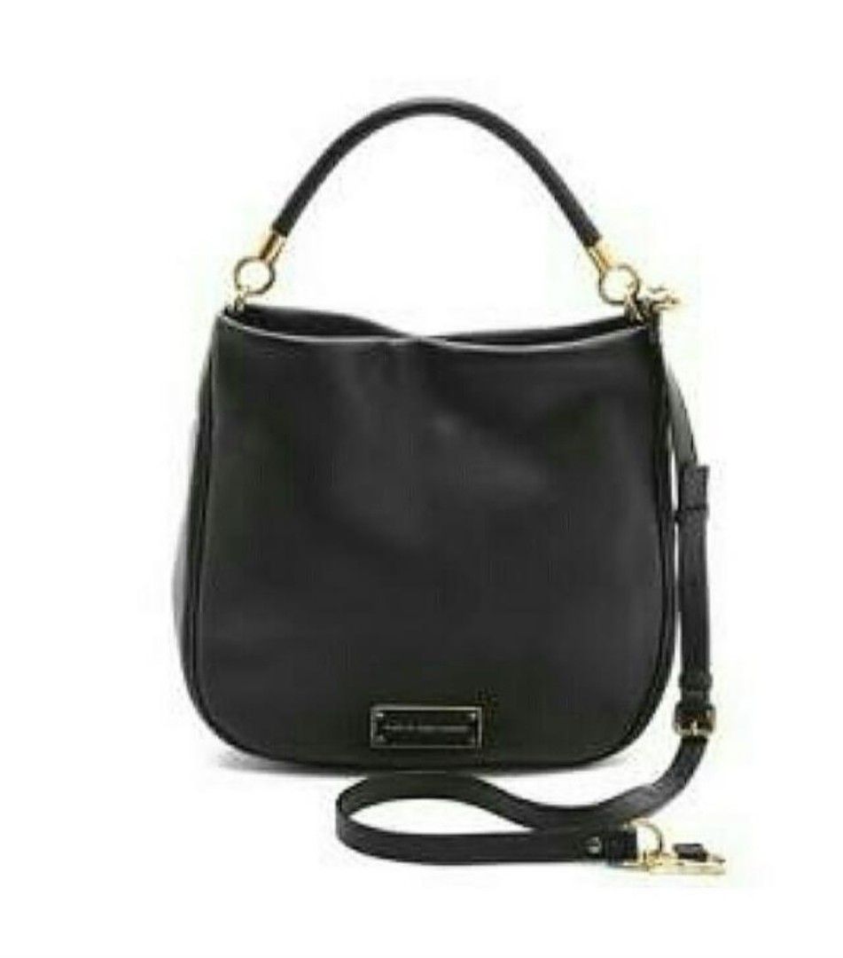 Marc by Marc Jacobs Black Leather Hobo Shoulder Bag (Category: Luxury Bags & Wallets) located in Manila. Submitted by wardrobemanila (Listing ID 1459412277, Image 2). Description: Selling my Pre owned AUTHENTIC Marc by Marc Jacobs bag Bought in Shangrila Mall at P25,000 Used less than 10 times only naka display lang sa walk in closet ng sobra tagal as in years hindi nagamit naka tago lang selling super duper low para ka lang bumili ng Charles and