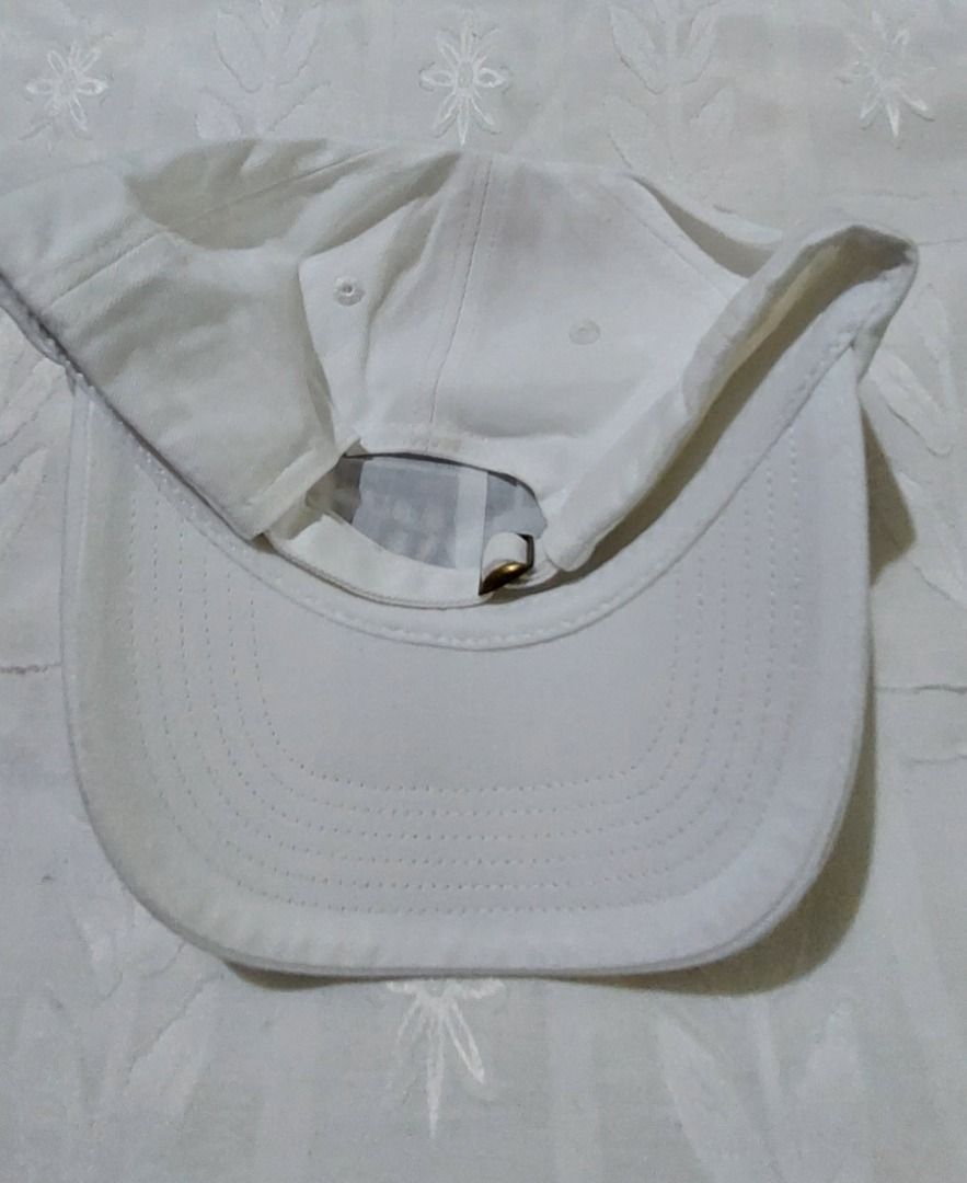 MARITHE FRANCOIS GIRBAUD PARIS White Baseball Cap (Category: Caps & Hats) located in Legazpi City. Submitted by street_uniform (Listing ID 1459336492, Image 3). Description: - White Marithe Francois Girbaud baseball cap - Features embroidered brand name on the front - Classic design with an adjustable strap at the back - Perfect for everyday wear.