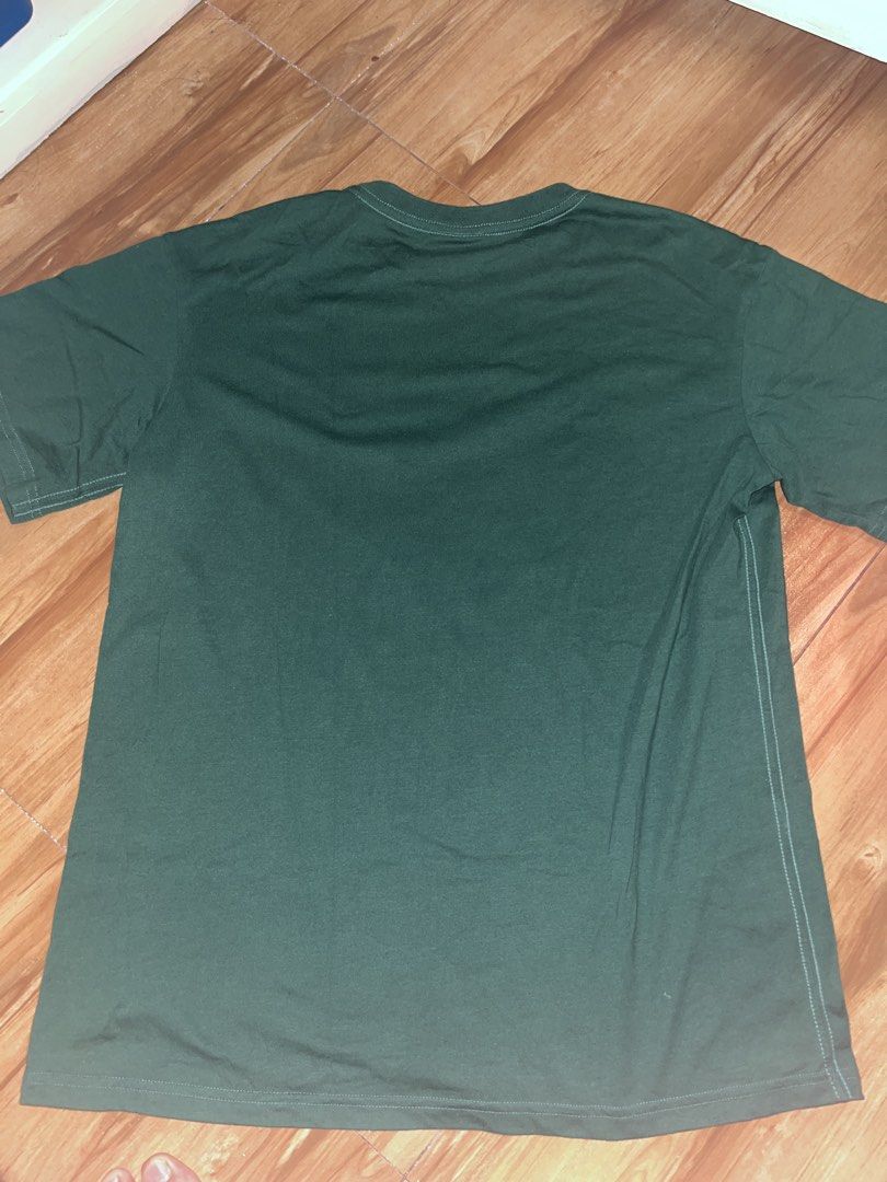 MARITHE FRANCOIS GIRBAUD Paris Green T-Shirt (Category: Shirts) located in Manila. Submitted by gbrxql (Listing ID 1459453287, Image 2). Description: - Brand: Marithe Francois Girbaud - Color: Green - Design: Features brand name and 'Paris' print on the front - Style: Simple, classic tee - Occasion: Ideal for casual wear.
