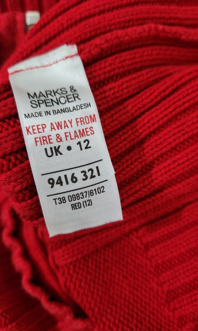 Marks & Spencer Red Zip-Up Knit Cardigan (Category: Coats, Jackets and Outerwear) located in Manila. Submitted by happybear_77e59e777 (Listing ID 1459204004, Image 3). Description: - Red knit cardigan from Marks & Spencer - Full zip-up front with a high collar - Ribbed knit details on sleeves and hem - Comfortable and warm - Ideal for layering - In good condition.