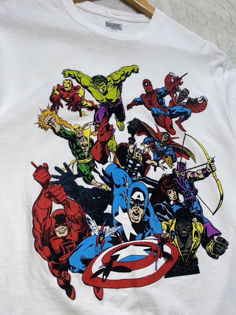 Marvel Comics Avengers Graphic T-Shirt (Category: Tshirts & Polo Shirts ) located in Davao. Submitted by chazethrift (Listing ID 1459368003, Image 2). Description: - White Marvel t-shirt - Classic Avengers graphic print featuring Iron Man, Hulk, Spider-Man, Captain America, Thor, and more - Made from 100% cotton - Size: Medium - Ideal for any Marvel fan!.