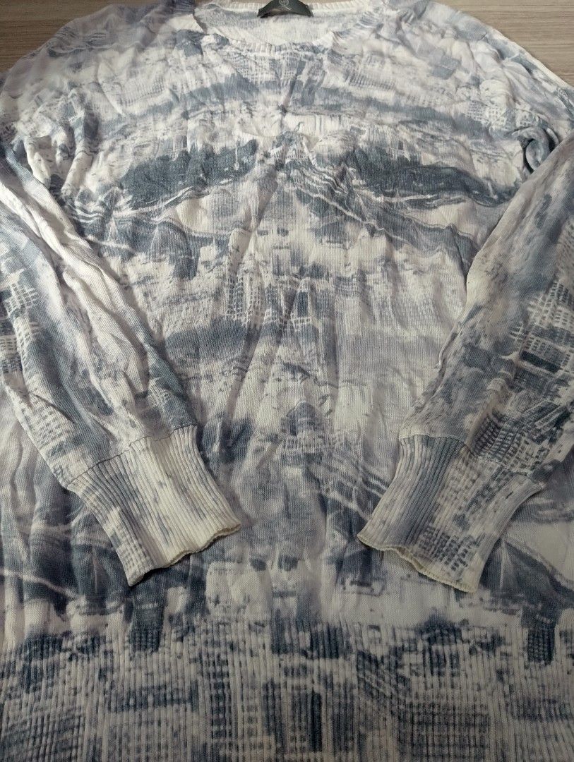 MCQ by Alexander McQueen Tie-Dye Knit Sweater (Category: Coats, Jackets and Outerwear) located in Manila. Submitted by thriftyboyzzz (Listing ID 1459397352, Image 2). Description: - MCQ knit sweater with a unique tie-dye pattern - Long sleeves and crew neck design - Crafted from 100% premium cotton - Made with care in Italy - Hand wash recommended for longevity - Versatile for layering or standalone wear.
