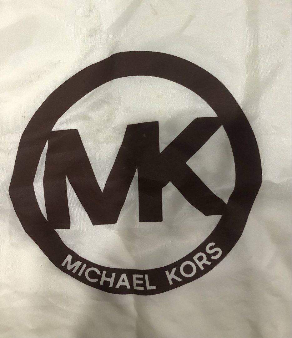 Michael Kors Dust Bag (Category: Luxury Bags & Wallets) located in Manila. Submitted by janmichael26601 (Listing ID 1459390476, Image 3). Description: - Original Michael Kors dust bag - Cream color with iconic MK logo - Approximate dimensions: 19 inches x 18 inches - Ideal for protecting handbags and accessories.