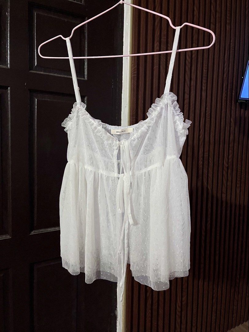 Molorda White Sheer Ruffle Tie Front Top (Category: Blouses) located in Subic. Submitted by httpsuflea (Listing ID 1459471345, Image 1). Description: - rfs: decluttering.