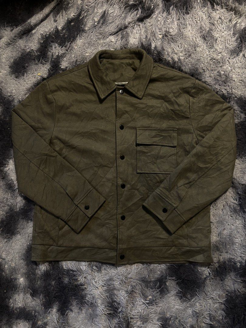 MOSS GREEN JACKET (Category: Coats, Jackets and Outerwear) located in Manila. Submitted by aeronmaurcio (Listing ID 1459340528, Image 2). Description: MOSS GREEN JACKET THICK JACKET NO ISSUES DOUBLE LAYER INSIDE LIKE NEW UNIQLO TYPE MADE FROM RECYCLED MATERIAL (LIKE THE ONE FROM UNIQLO) W- 23.5 L- 27 SLEEVES- 24.