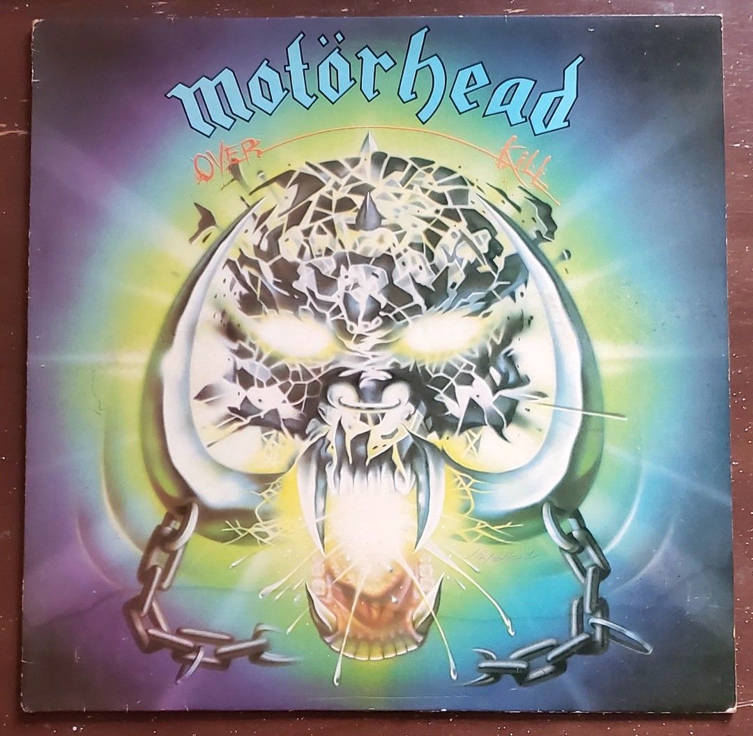 Motörhead - Overkill Vinyl LP 1981 UK pressing (Category: Vinyls) located in Puerto Princesa. Submitted by jomoski2 (Listing ID 1459391432, Image 1). Description: vinyl LP, 1981 UK pressing Label : Chrome Records Media - EX sleeve - Good sleeve is damaged at the back.