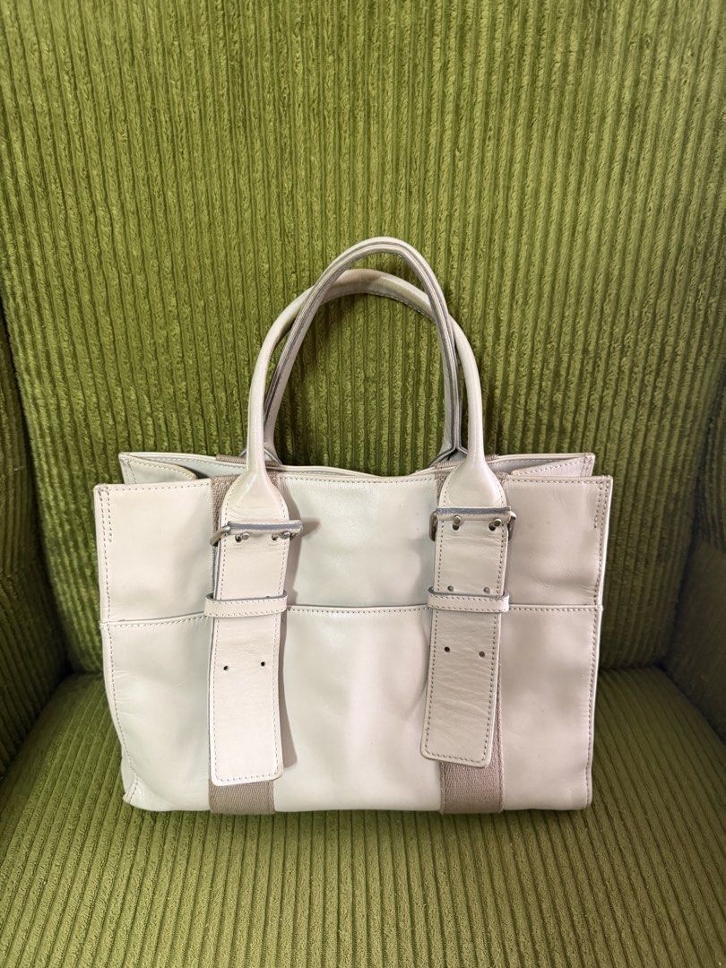 Mulberry Bayswater Tote Bag (Category: Luxury Bags & Wallets) located in Manila. Submitted by lovelystuffmaycomeandgo (Listing ID 1459342593, Image 1). Description: - Genuine cream-colored Mulberry Bayswater tote - Crafted from high-quality leather - Elegant buckle details on the front - Secure magnetic snap closure - Convenient interior zip pocket - Ideal for everyday use - Spacious interior for all your essentials.