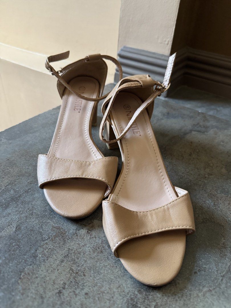N STYLE Tan Block Heel Sandals with Ankle Strap (Category: Heels) located in Bacoor. Submitted by nicafindssince2022 (Listing ID 1459405417, Image 1). Description: - Brand: N STYLE - Color: Tan - Style: Block heel sandals - Features: Ankle strap with buckle closure, open toe - Heel Height: Moderate, comfortable for extended wear - Condition: Soles show some signs of wear - Versatility: Great for dressing up or down - Size 40.