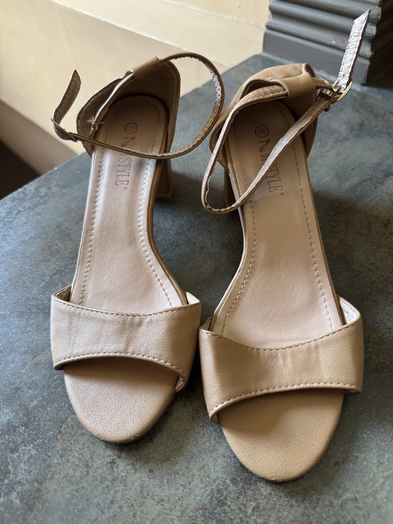 N STYLE Tan Block Heel Sandals with Ankle Strap (Category: Heels) located in Bacoor. Submitted by nicafindssince2022 (Listing ID 1459405417, Image 2). Description: - Brand: N STYLE - Color: Tan - Style: Block heel sandals - Features: Ankle strap with buckle closure, open toe - Heel Height: Moderate, comfortable for extended wear - Condition: Soles show some signs of wear - Versatility: Great for dressing up or down - Size 40.