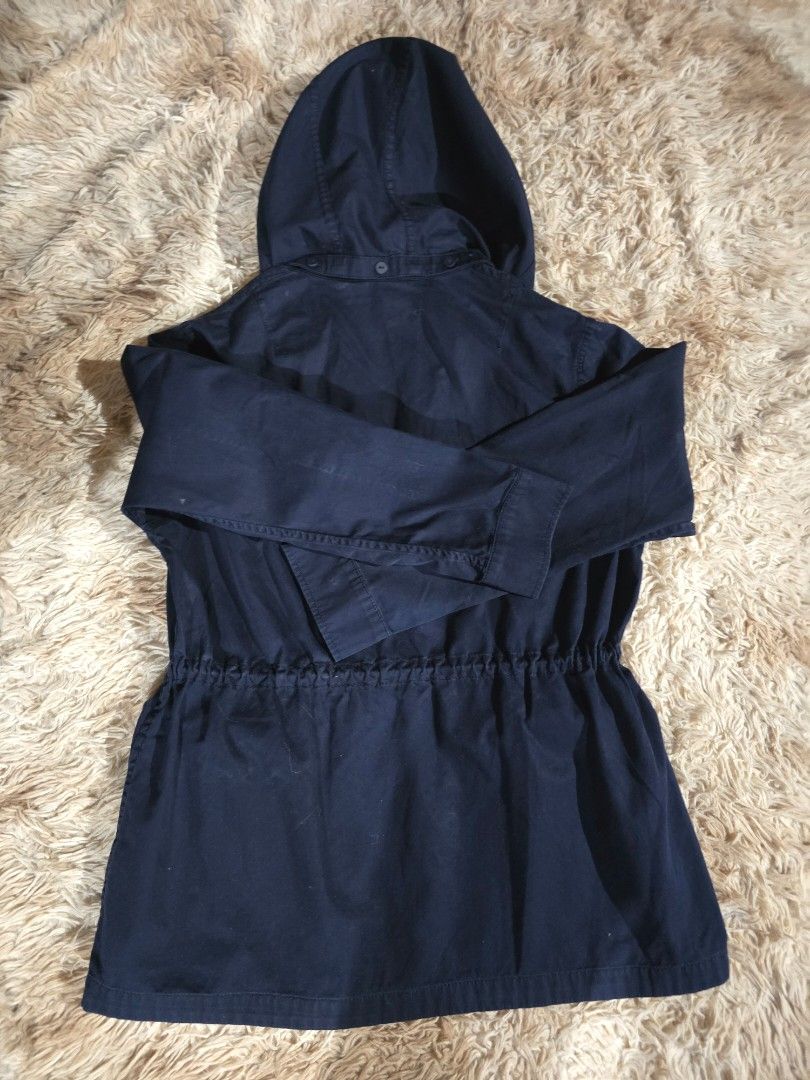 Navy Blue Hooded Jacket with Drawstring Waist (Category: Coats, Jackets and Outerwear) located in Paranaque City. Submitted by ccc_finds (Listing ID 1459447088, Image 2). Description: Color: Navy blue Size: Medium Condition: Used once; no flaws Measurements: Shoulder - 17 in. Chest width - 20 in. Jacket length - 26 in. Sleeve length - 22 in. Arm sleeve width - 7.5 in Features: - Navy blue hooded jacket - Utility style with multiple pockets - Draw