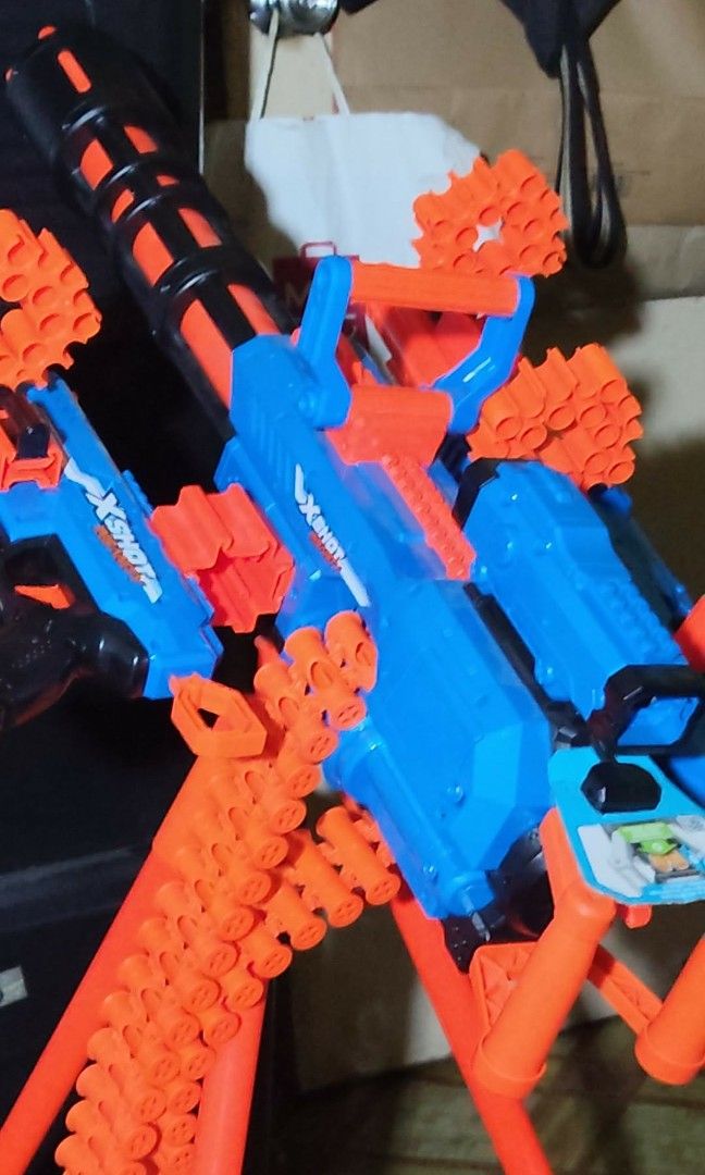 Nerf Gun set (Category: Action & Battle Toys) located in Valenzuela. Submitted by altheaphia.alca_921 (Listing ID 1459462629, Image 2). Description: X-Shot Insanity Set - X-Shot Insanity Manic: 699 srp X-Shot Insanity Berzerko: 1,999 srp X-Shot Insanity Motorized Rage Fire Blaster: 3,499 srp Good condition Total: 6,197 Selling: 5,400 Note: kasama ung stand. Display lang (hindi nagamit) Rfs: Declutter.
