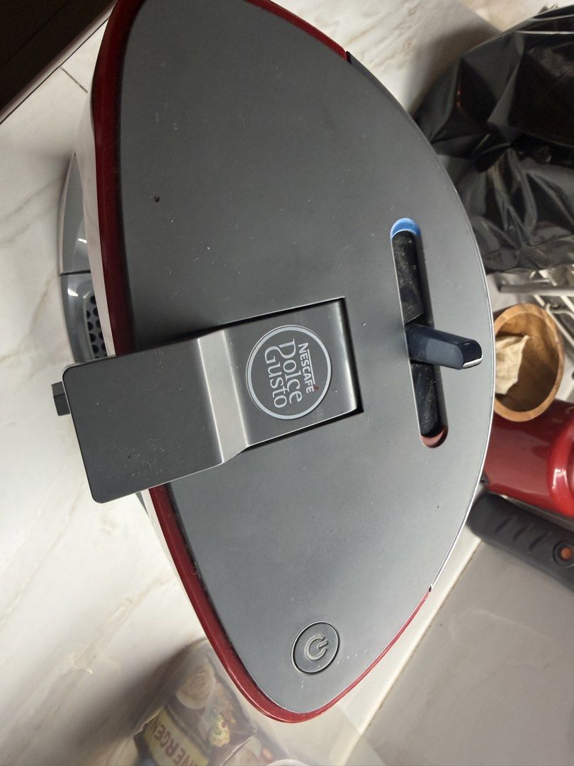 Nescafé Dolce Gusto Red Coffee Machine (Category: Coffee Machines & Makers) located in Mandaluyong City. Submitted by pam_1026 (Listing ID 1459453740, Image 2). Description: - Red Nescafé Dolce Gusto coffee machine - Works well and is easy to use .