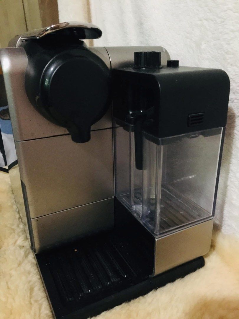Nespresso DeLonghi Coffee Machine (Category: Coffee Machines & Makers) located in Baguio. Submitted by izza_thrifty (Listing ID 1459361805, Image 2). Description: - Nespresso coffee machine by DeLonghi - Works well and makes great coffee - Easy to operate - Includes power cord - Ready for a new home.