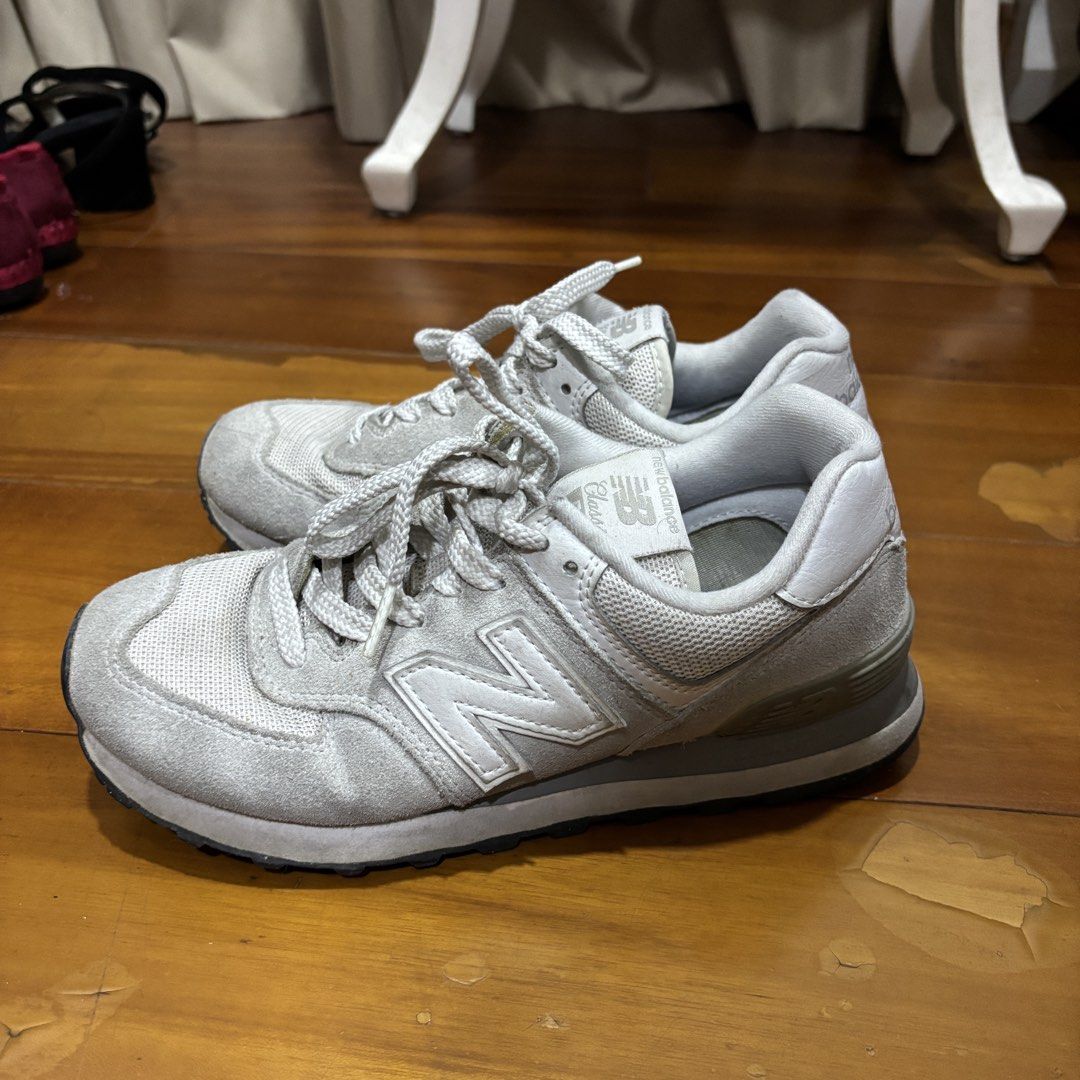 New Balance 574 Classic Grey Sneakers (Category: Sneakers) located in Manila. Submitted by booksandbeyond (Listing ID 1459411302, Image 3). Description: size 7 (24cm) - Grey New Balance 574 sneakers - Perfect for everyday wear - Shows some signs of use.