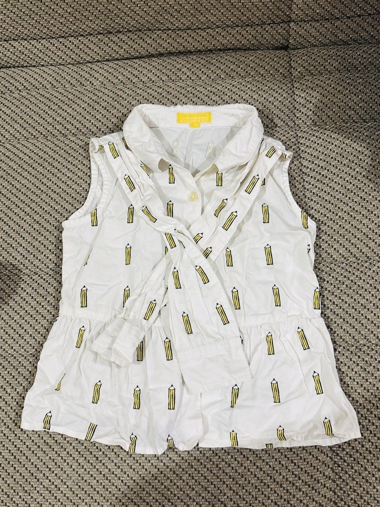 Nicholas & Bears Sleeveless Shirt (Category: Babies & Kids Fashion) located in La Trinidad. Submitted by secondsmatter (Listing ID 1459310417, Image 1). Description: - White sleeveless shirt for girls - All-over fun yellow pencil print - Features a collar and button-up front - Slightly gathered hem for a cute look - Ideal for casual and playful outfits -for 2-3y/o.