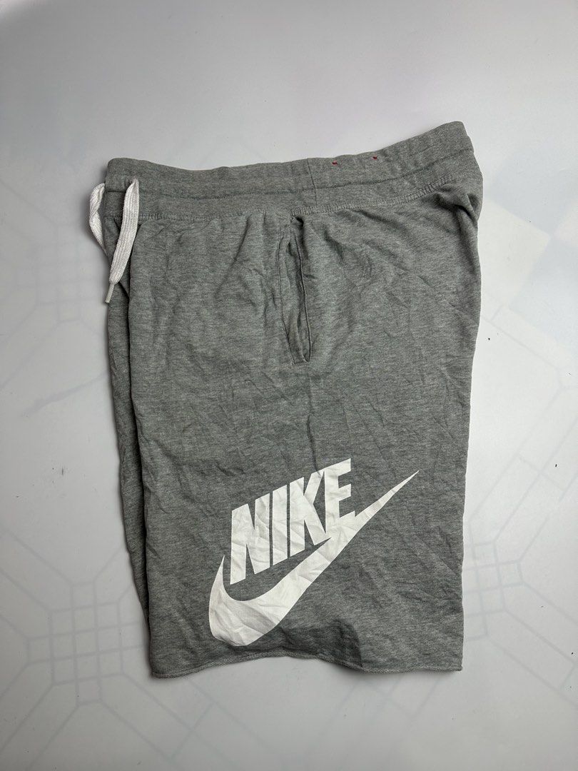 Nike alumni (Category: Shorts) located in Orani. Submitted by ajgav69 (Listing ID 1459380107, Image 3). Description: Alumni Gray Actual dimes Waistline- 31-38 20 length Color rate 10/10 No issue No hole No crack No hairlines 📩📩📩.