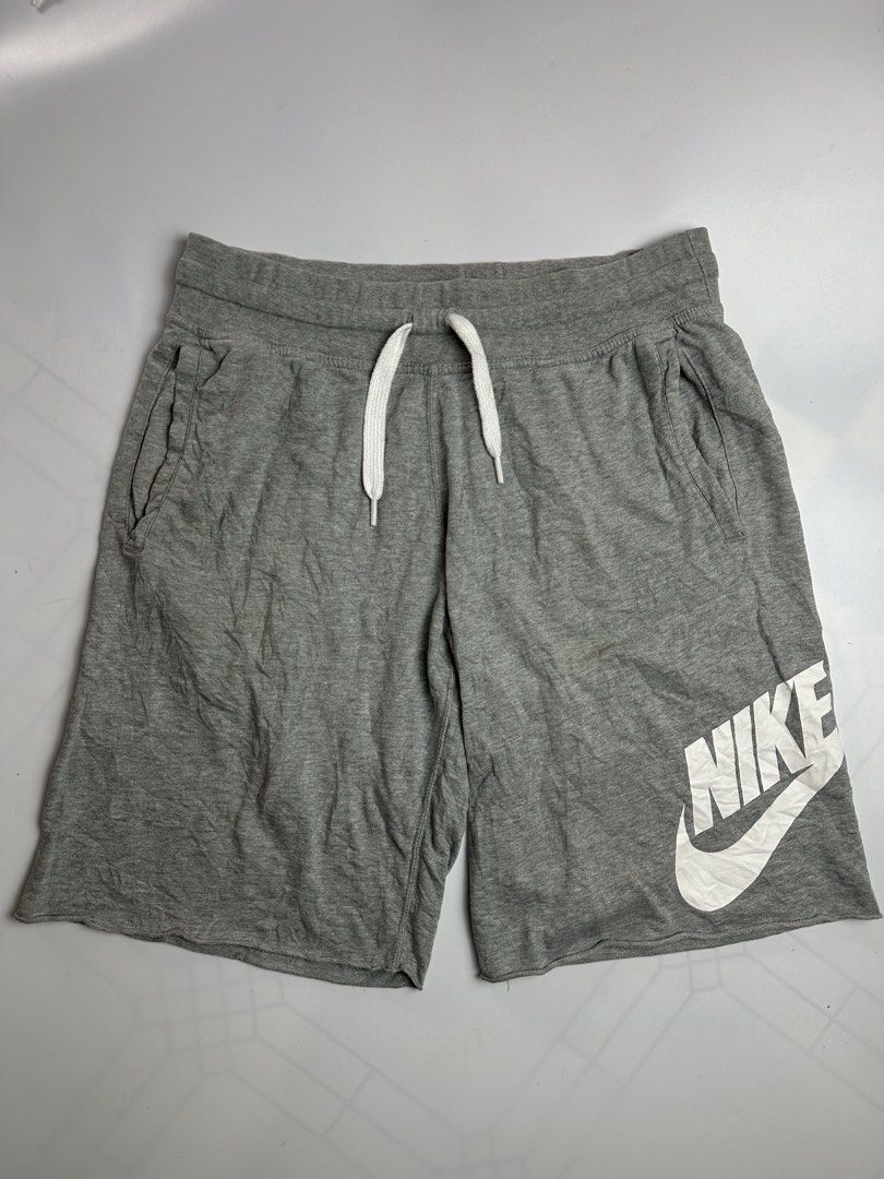Nike alumni (Category: Shorts) located in Orani. Submitted by ajgav69 (Listing ID 1459380107, Image 1). Description: Alumni Gray Actual dimes Waistline- 31-38 20 length Color rate 10/10 No issue No hole No crack No hairlines 📩📩📩.
