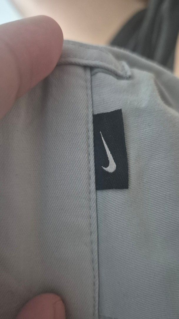 Nike Golf Modern Fit Dri-Fit Pants (Category: Trousers) located in Valencia. Submitted by declutterainnn (Listing ID 1459325580, Image 3). Description: - Grey Nike Golf Pants - Modern Fit - Dri-Fit Technology - Size: XXL (Waist 35) - Button closure with zip fly - Side zip pocket - Ideal for golfing or casual wear - Made in China.