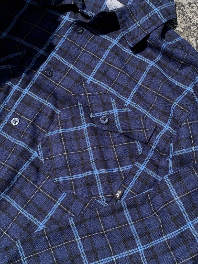 Nike SB Plaid Flannel Long Sleeve (Category: Tshirts & Polo Shirts ) located in Manila. Submitted by shawnaxl (Listing ID 1459306931, Image 2). Description: - Nike SB Blue Plaid Flannel - Size: XL - Long sleeves with button cuffs - Two chest pockets with button closures - Perfect for layering or wearing solo.
