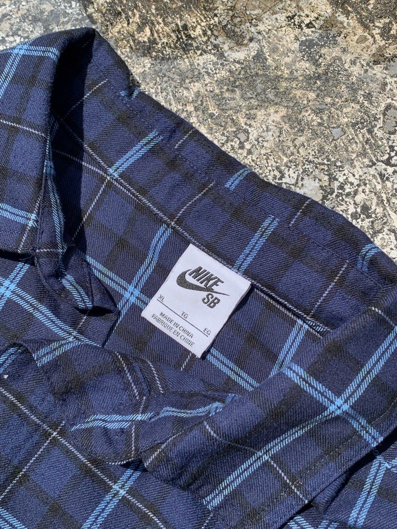 Nike SB Plaid Flannel Long Sleeve (Category: Tshirts & Polo Shirts ) located in Manila. Submitted by shawnaxl (Listing ID 1459306931, Image 3). Description: - Nike SB Blue Plaid Flannel - Size: XL - Long sleeves with button cuffs - Two chest pockets with button closures - Perfect for layering or wearing solo.