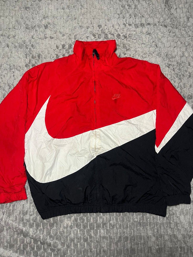 Nike tritone Big Swoosh Windbreaker Jacket (Category: Coats, Jackets and Outerwear) located in Cagayan de Oro. Submitted by smoothstyle (Listing ID 1459343185, Image 2). Description: Nike tritone Big Swoosh Windbreaker Jacket Excellent condition 9.5/10 color rate Size : XXL Dimes: 27x27.5 need wash.