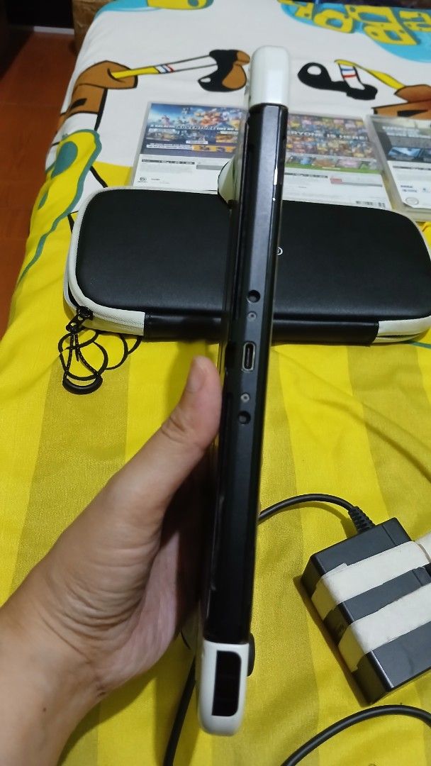 Nintendo Switch OLED Console with Games and Case (Category: Nintendo) located in Imus. Submitted by dahdahlicious (Listing ID 1459325682, Image 3). Description: - Nintendo Switch OLED Model console - Original dock and Joy-Cons included - Comes with a protective carrying case - Games included: Sonic Frontiers, Mario + Rabbids Sparks of Hope - All games are in their original cases - Ready for both home console and portable play.