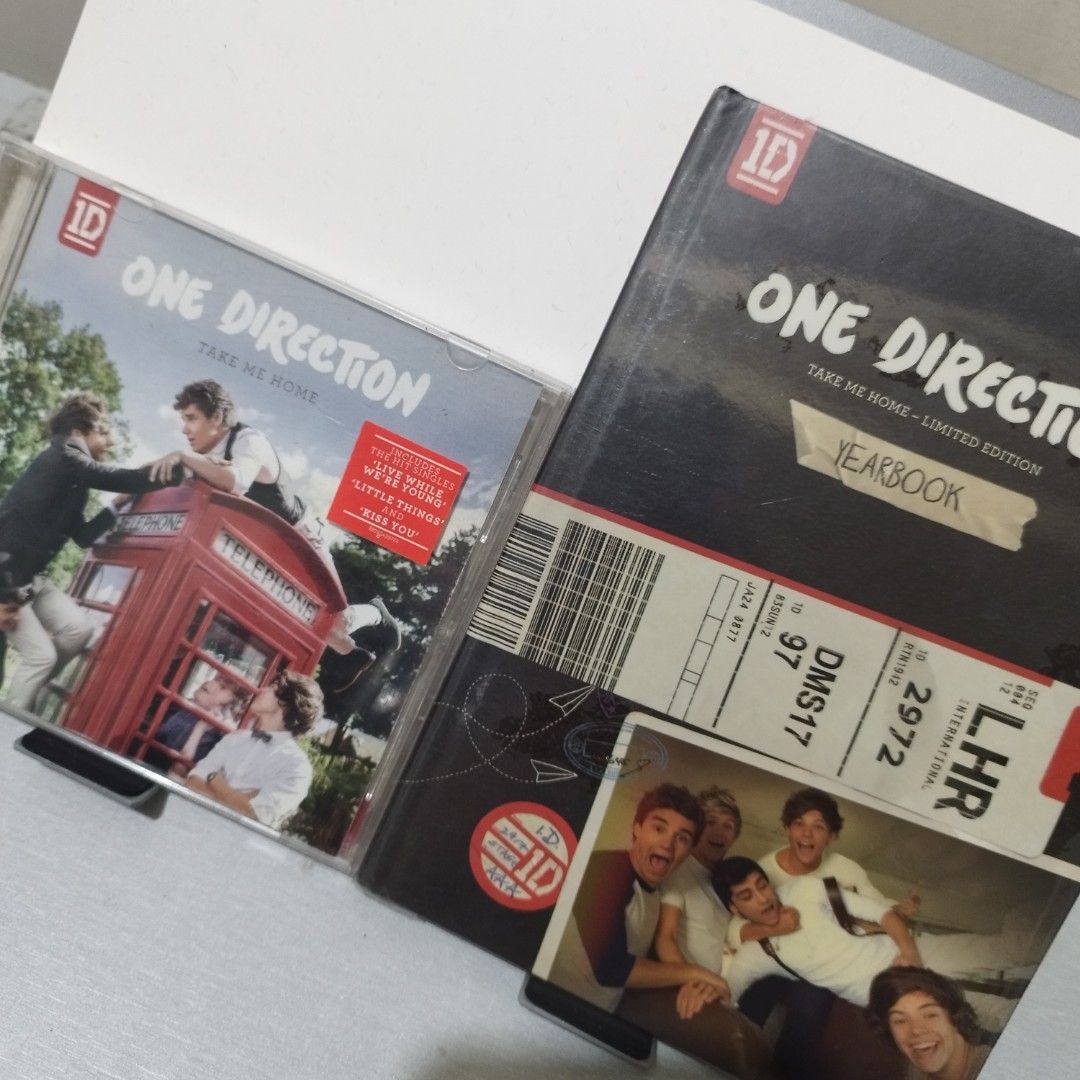 One Direction Take Me Home CD & Limited Edition Yearbook (Category: CDs & DVDs) located in Manila. Submitted by love.aiden (Listing ID 1459482815, Image 1). Description: - One Direction 'Take Me Home' CD: Features all original album tracks. P200 - Limited Edition Yearbook: Packed with exclusive photos and messages from the band. (Penshoppe Exclusive) P800 TAKE ALL: P900 - Perfect for any dedicated Directioner. - Ideal addition to your One Directi
