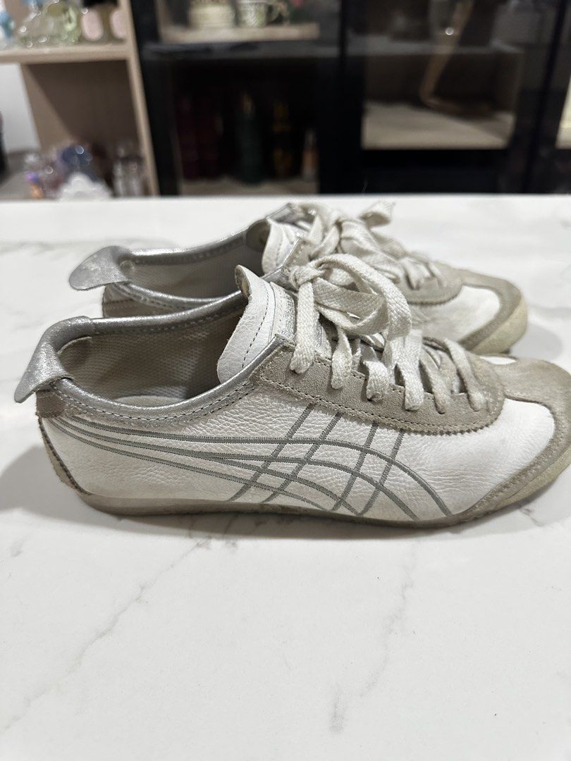 ONITSUKA Mexico 66 White/Silver (Category: Sneakers) located in Angeles City. Submitted by claudinelaz (Listing ID 1459355954, Image 1). Description: onhand/mint condition - brand: onitsuka tiger - ₱1,900 - size: US 5 1/2 W - original box included - well used, dirt can still be cleaned - RFS: too small on me & decluttering - mop 🧾: gcash/ bank transfer (payo) - mod 🚚: j&t or lbc dm me to claim! dm for more photos!.