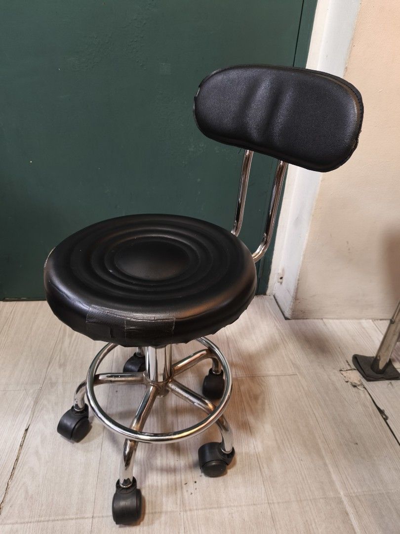 Orange Massage Table with Black Tattoo Chairs (Category: Tables & Sets) located in Pasig City. Submitted by tantan7828659 (Listing ID 1459293395, Image 2). Description: Tattoo bed Tattoo Chair Tattoo Arm Rest Chair with Arm rest - Orange foldable massage table with face cradle hole - Black rolling stool with adjustable height and backrest - Black adjustable tattoo artist chair with armrest and wheels - All items are used and in good working condi