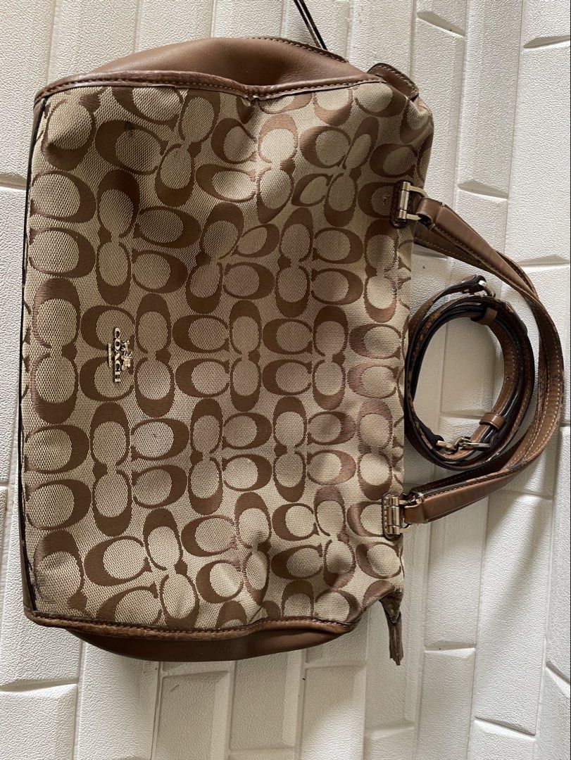 Orig Legit Coach Two way bag (Category: Everything Else Others) located in Caloocan City. Submitted by mdvs.bagsnmore (Listing ID 1459421155, Image 2). Description: Original Preloved with signs of wear, tolerable flaws as seen in photos hence the low price. - minor rubs in fabric - strap rubber lining Still presentable and has plenty of life left location: Caloocan North MOP: BDO, Gcash, Gotyme nationwide shipping via J&T Lalamove ready SF: buyer